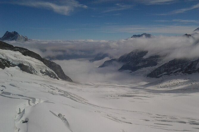 Alpine Majesty:From Zürich to Jungfraujoch Exclusive Private Tour - The return ride: Wengen passes and Lauterbrunnen waterfall views