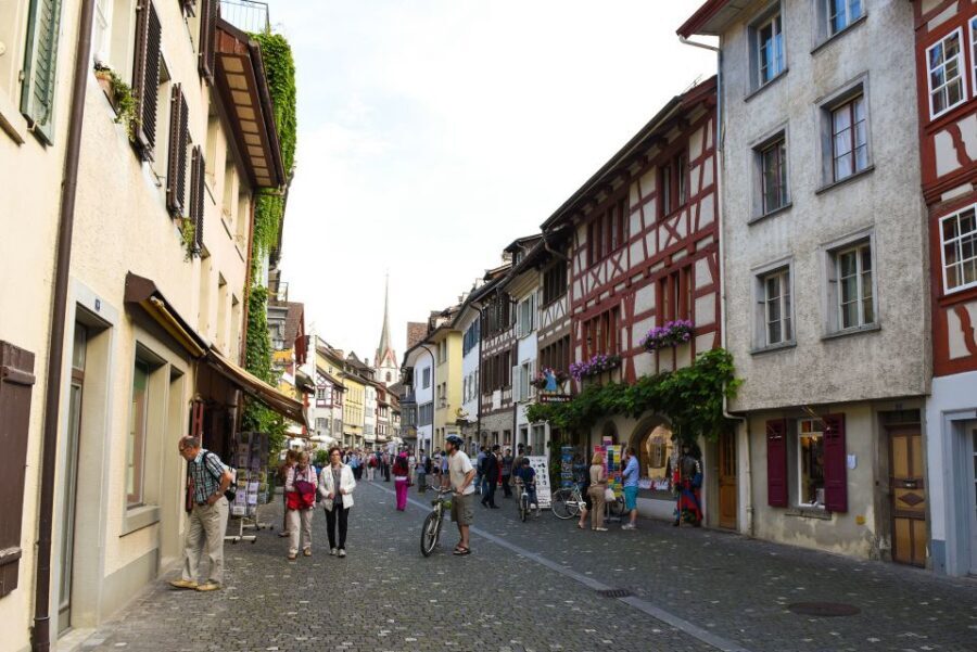 From Zurich: Private 4 Countries in 1 Full-Day Tour - Lindau, Germany: island streets and the harbor lion