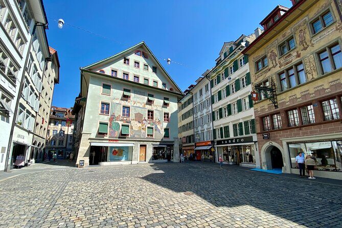 Glacier Express, Swiss Alps & Lucerne Tour | From Zurich - Lucerne Old Town walk: Chapel Bridge and the Lion Monument