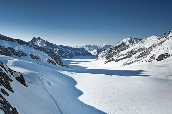 Jungfraujoch: Top of Europe Day Trip from Zurich - Walking the Ice Palace: Glacier Footsteps, Short and Memorable