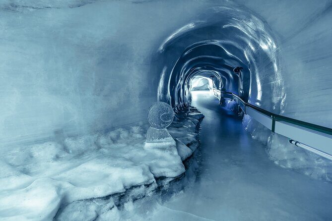 Titlis, the eternal snow mountain, and Lucerne Village - Titlis: Rotair Up to 3,020 m, Ice Caves, and Walkways