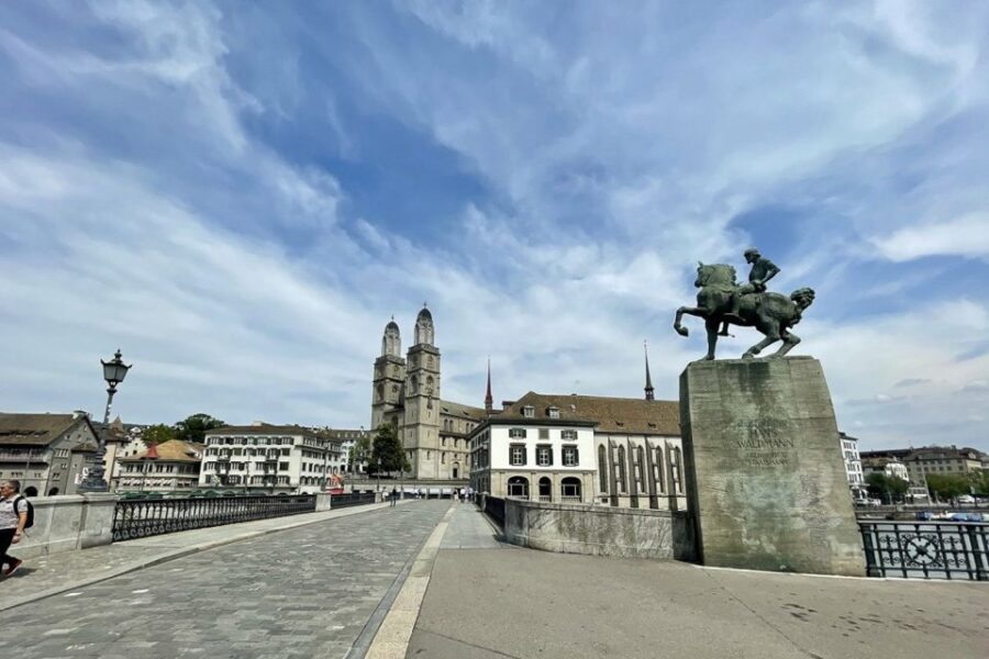 Zurich: City Tour, Cruise, and Lindt Home of Chocolate Visit - Old Town Stroll: Churches, Guild Houses, and the St. Peter Clock