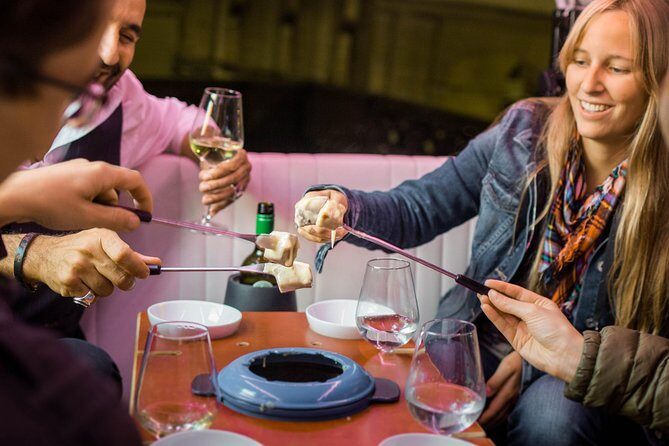 Zurich eTukTuk Private Tour - with Cheese Fondue and Wine - The church stops: Fraumünster stained glass and Grossmünster towers
