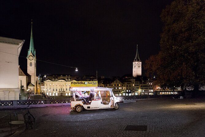 Zurich eTukTuk Private Tour - with Cheese Fondue and Wine - Limmatquai waterfront views and why the ride feels effortless