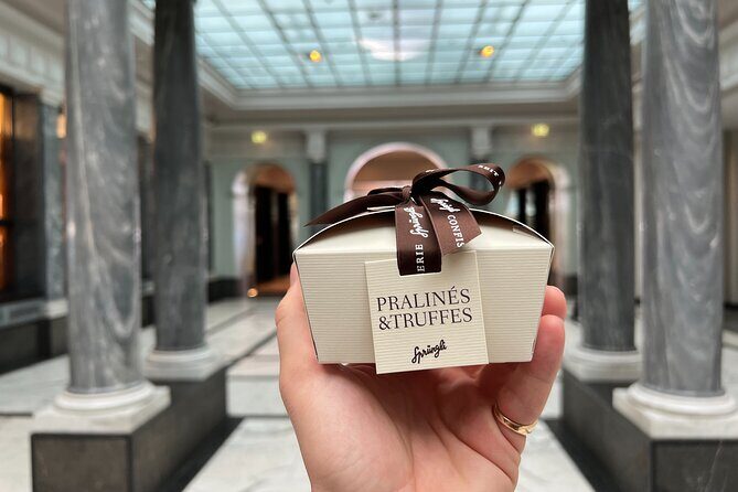 Zurich Food Tour with 10 Local Delicacies, Cheeses & Chocolates - Fraumünster and St. Peter’s: spires, the big clock, and a pause in the flow